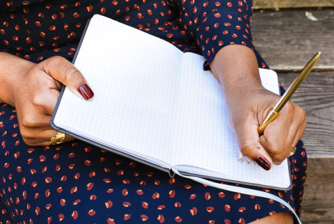 Woman Journaling Outdoors