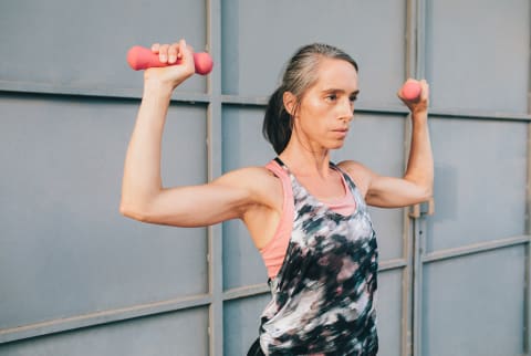 Woman Lifting 3 Pound Weights Outdoor