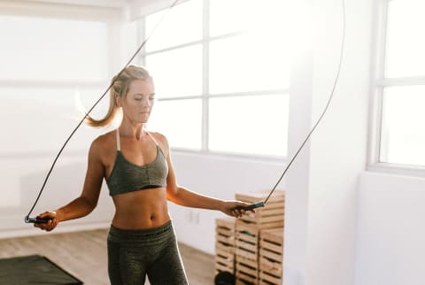 Woman Jumping Rope at the Gym